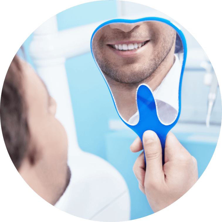 pinhole technique patient looking in mirror smiling