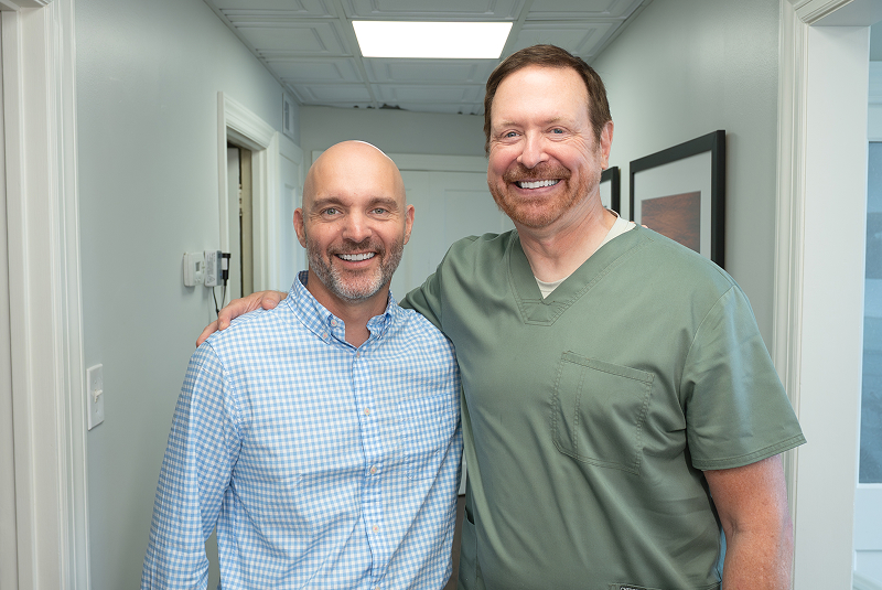 Dr. Kohler standing with a patient in the dental office