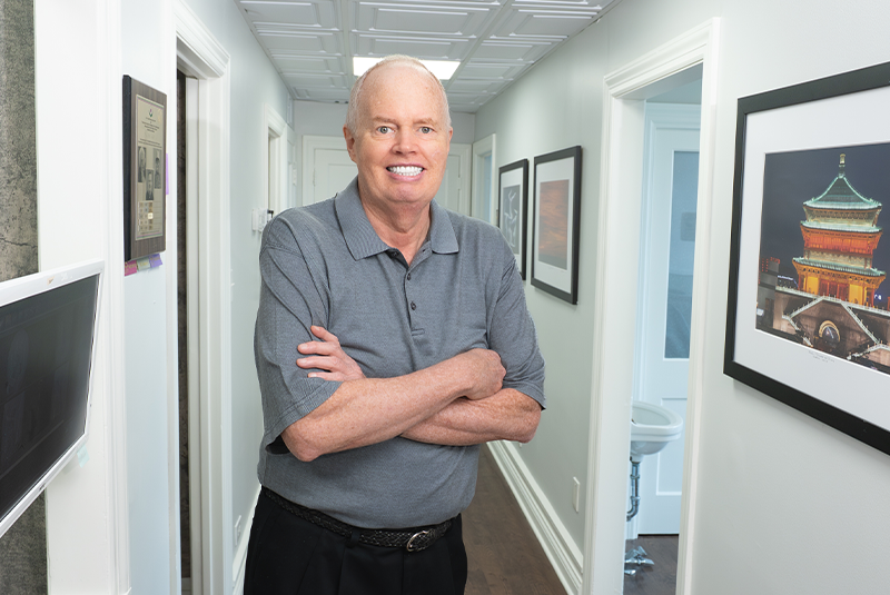 Jack smiling after receiving removable All-on-X treatment