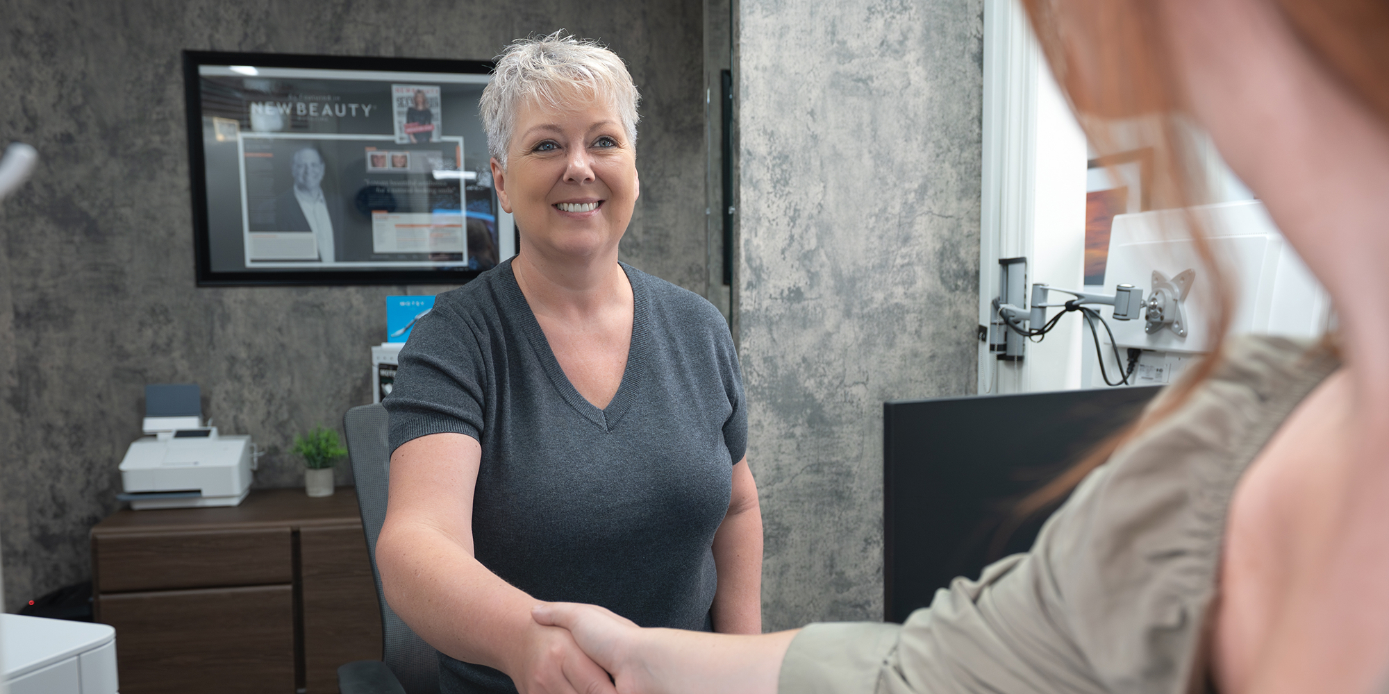 Staff member greeting patient